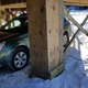 Behind the plywood is the water line and the septic line.